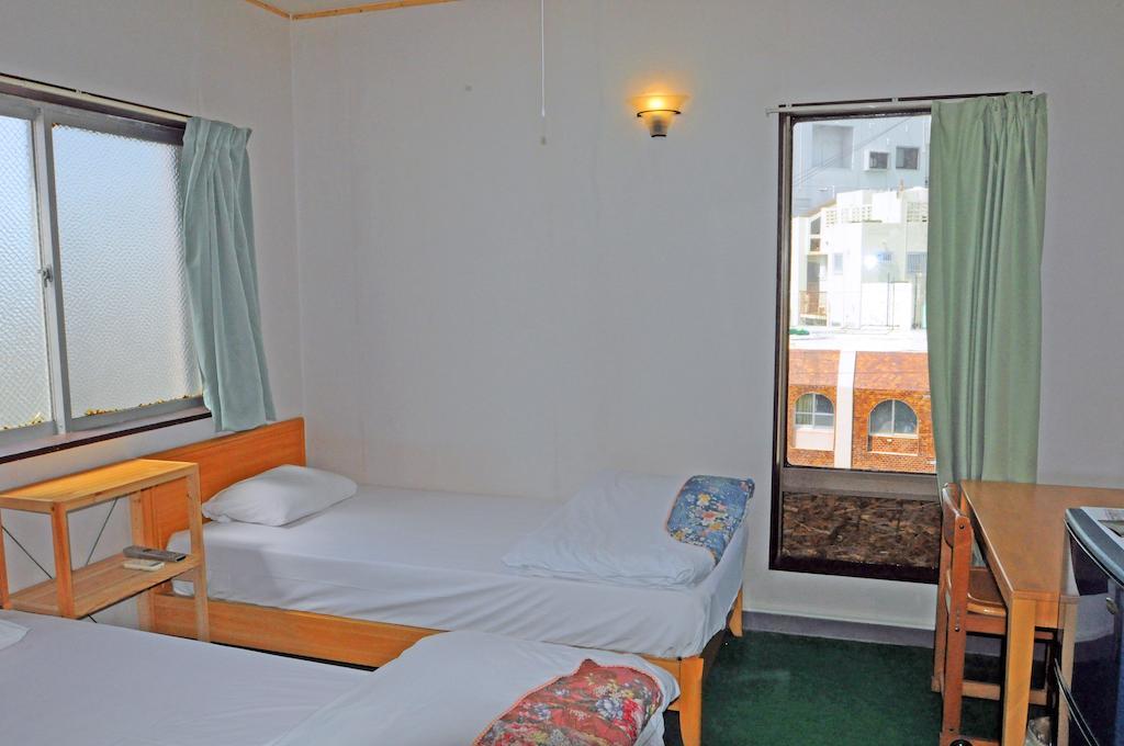 Yoshida Hotel Okinawa Quarto foto